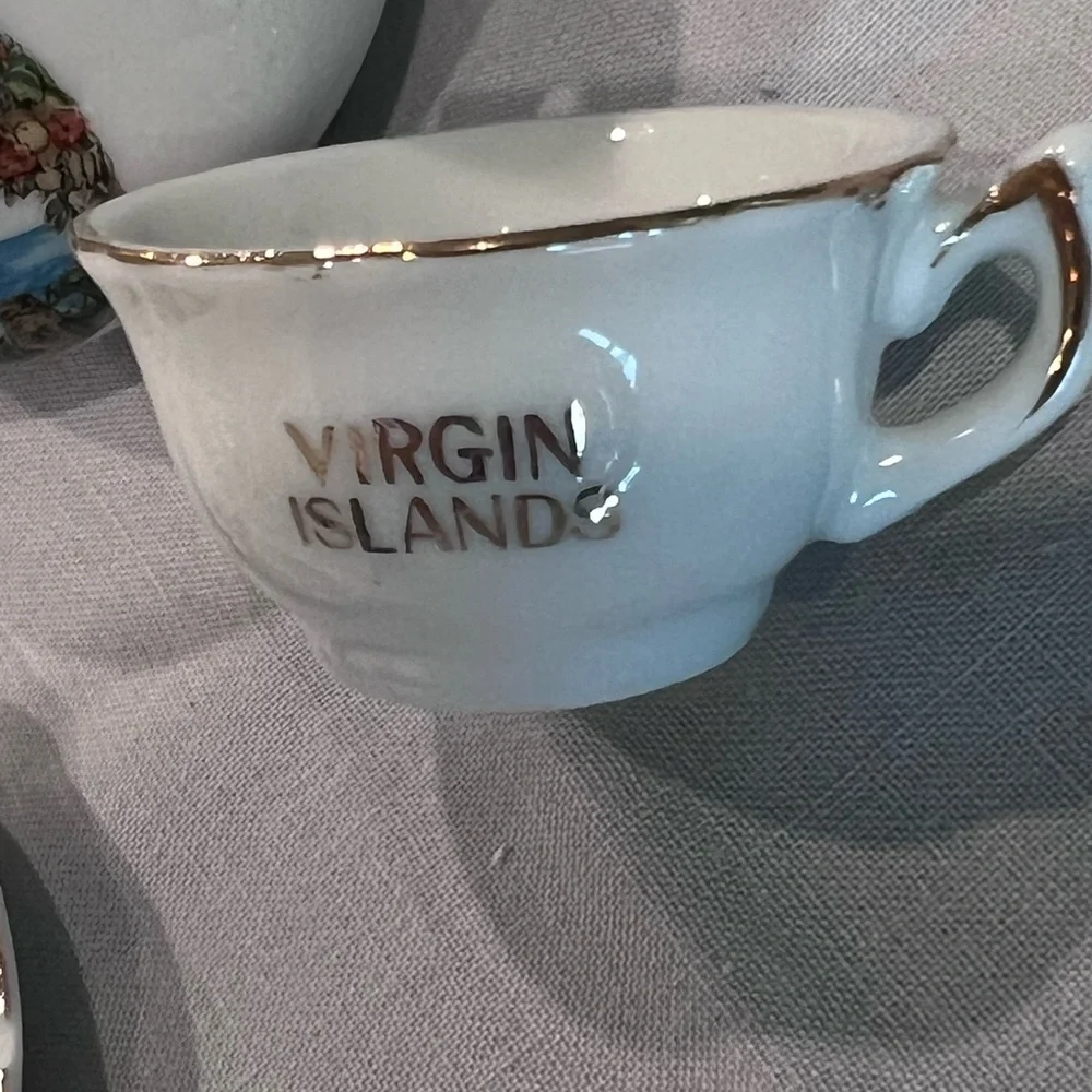 Miniature teapot, cup and saucer set